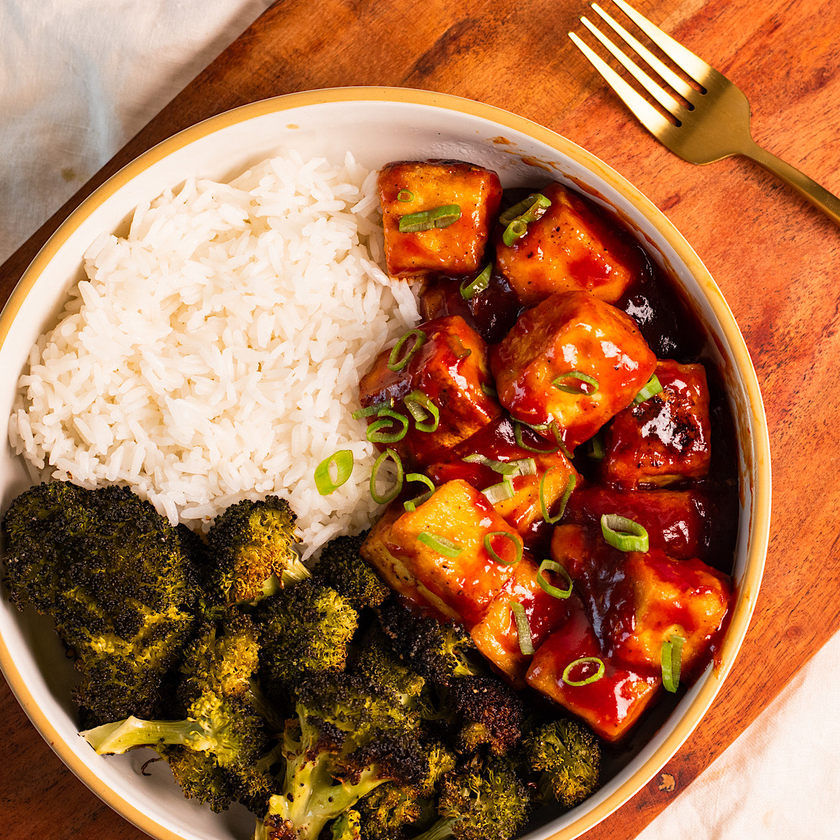 sticky sweet and sour tofu with broccoli.