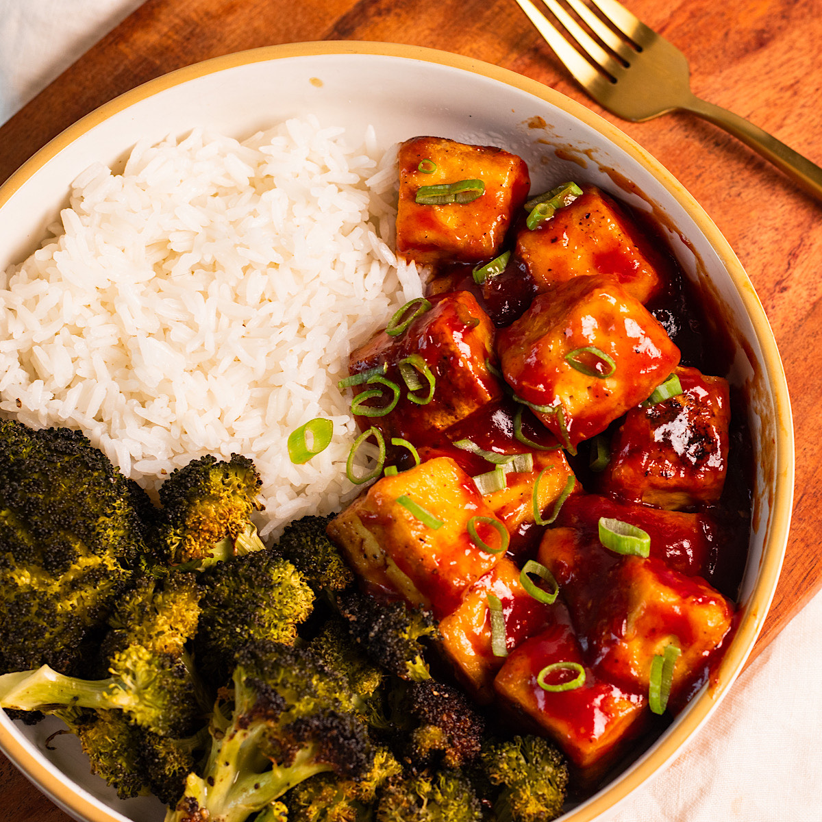 sticky sweet and sour tofu with broccoli.