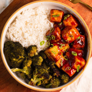 sticky sweet and sour tofu with broccoli.