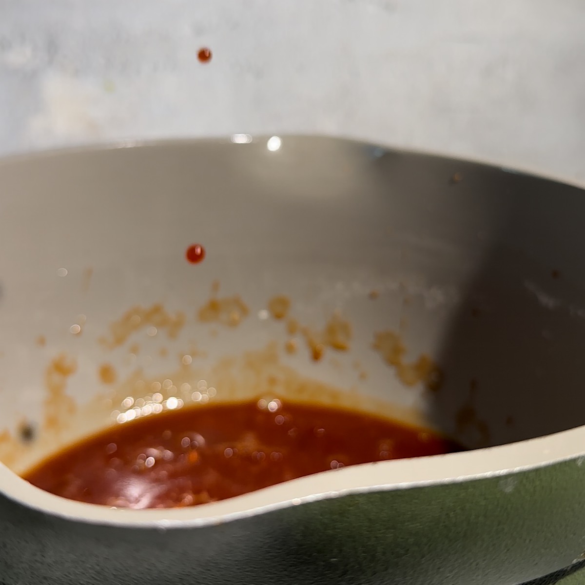 sweet and sour sauce in pot.