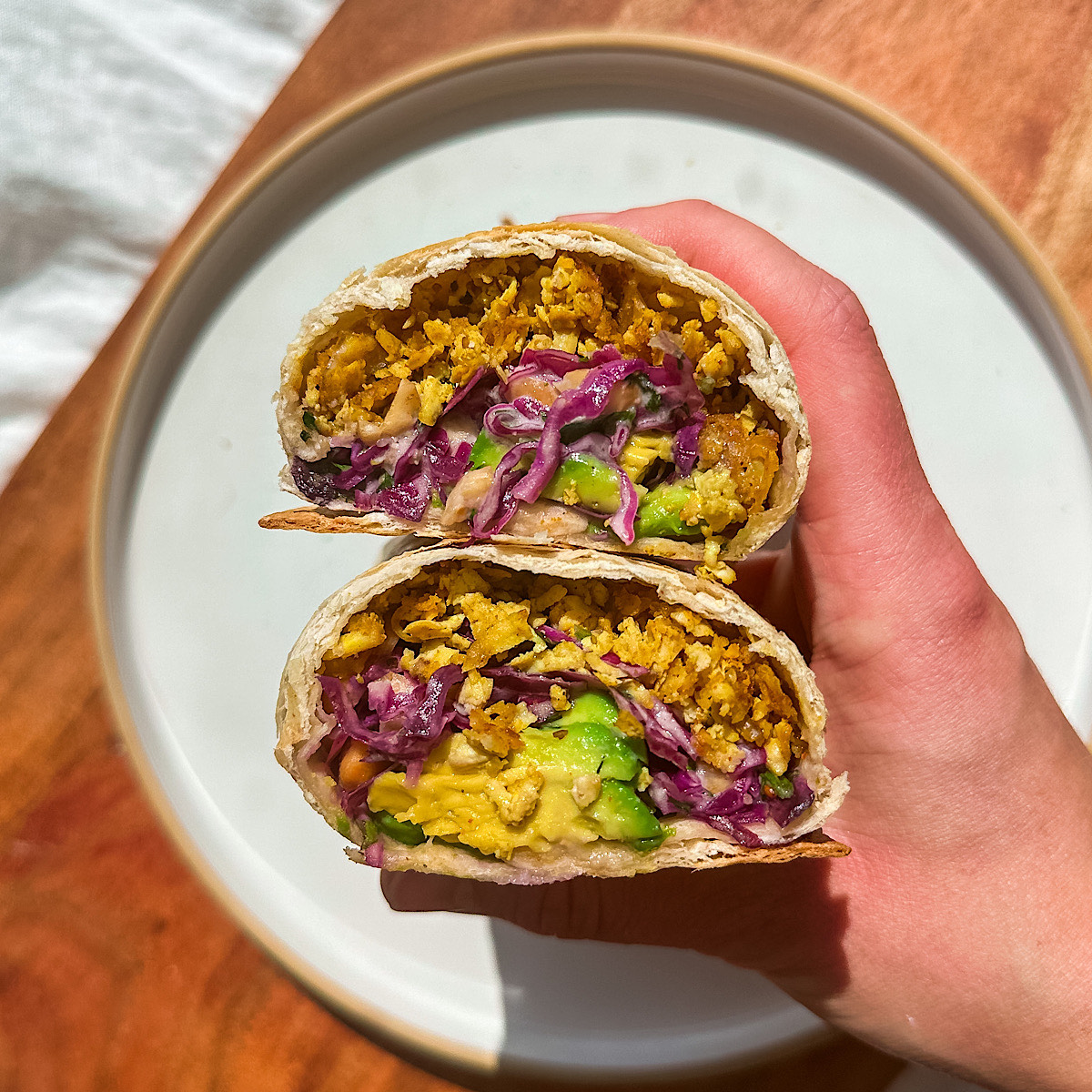 curried shredded tofu burrito with cabbage slaw