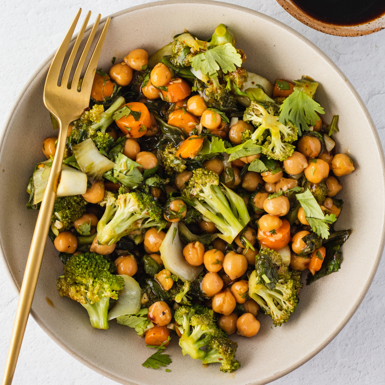 vegan chickpea stir fry with broccoli, carrots and bok choy