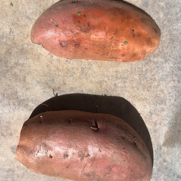 sweet potatoes on sheet pan