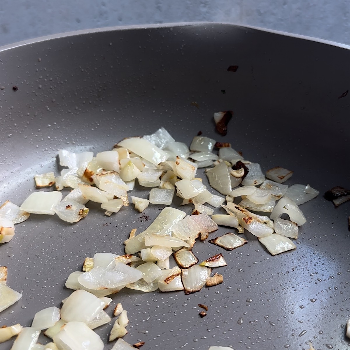 onions and garlic in pan