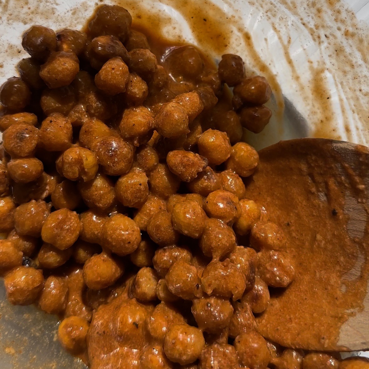 chickpeas and buffalo sauce in bowl