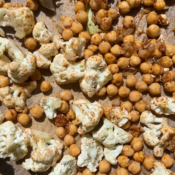 cauliflower and chickpeas on a sheet pan
