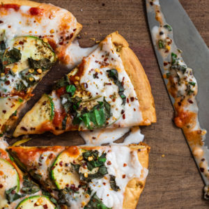 vegan zucchini pizza with basil and lemon
