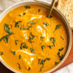 Vegan Creamy Carrot Tomato Soup with Cashews and Basil