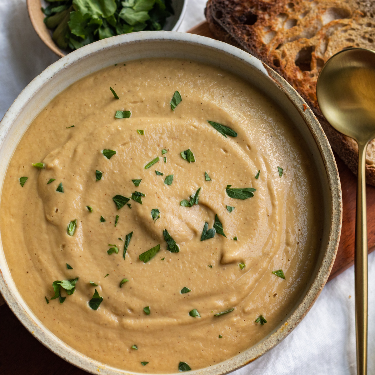 vegan garlic soup with cauliflower and tahini