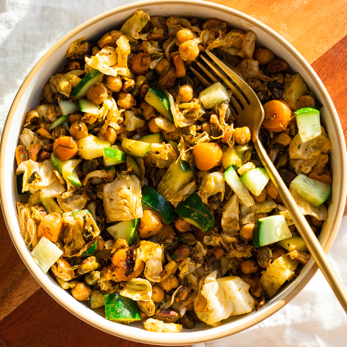 baked warm cabbage, carrots and chickpea salad with basil scallion vinaigrette