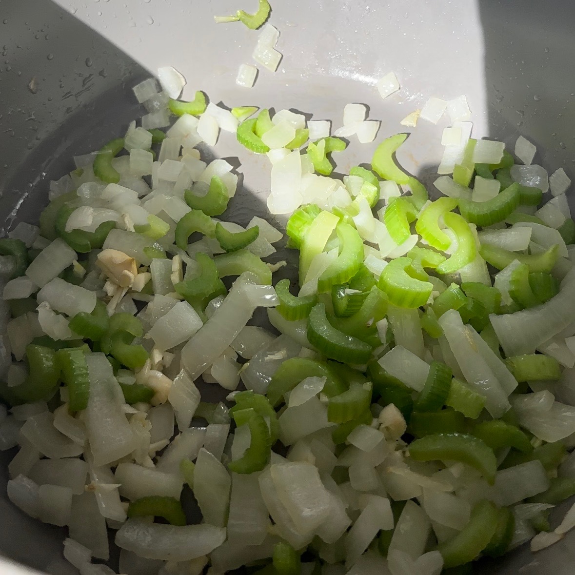 onion celery and garlic in pot