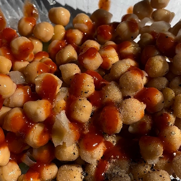 chickpeas in bowl with sauce