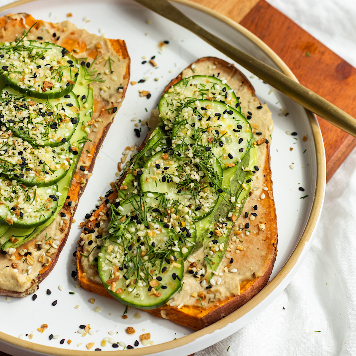 baked sweet potato toast with hummus and avocado