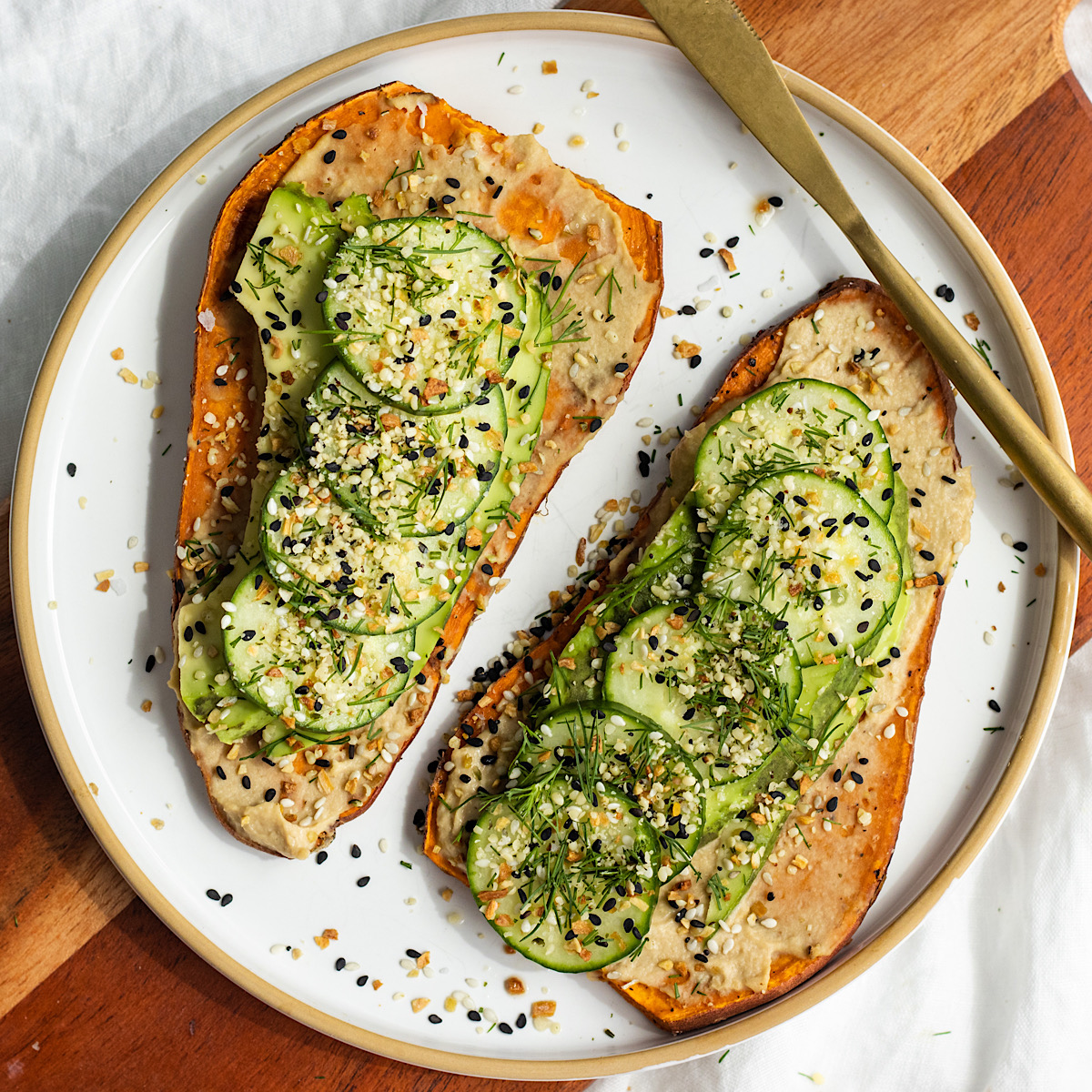 baked sweet potato toast with hummus and avocado