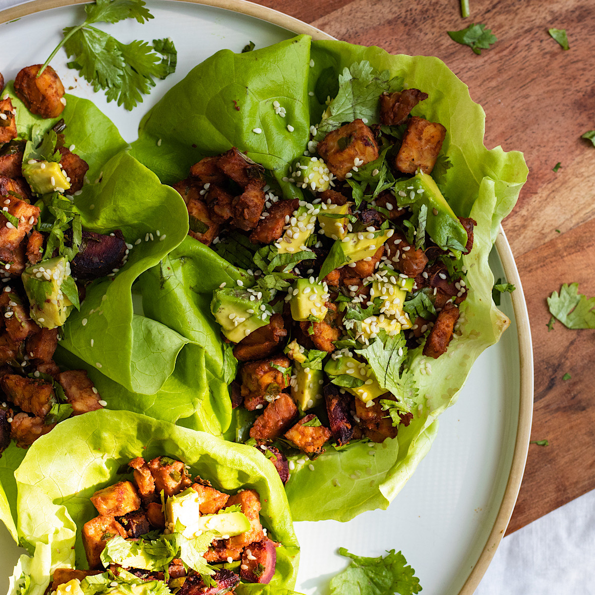 vegan buffalo tempeh carrot lettuce wraps