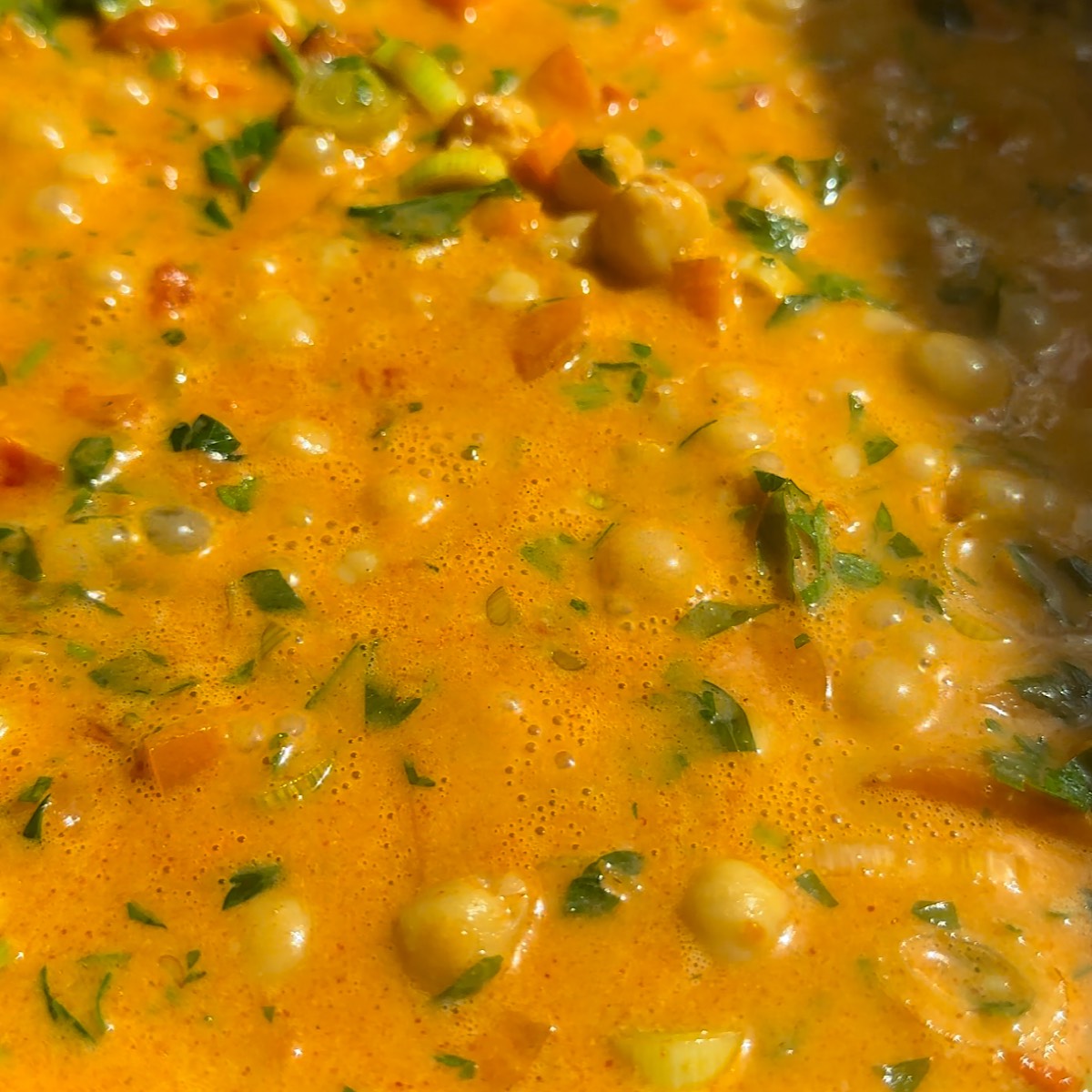 harissa chickpea ingredients in skillet