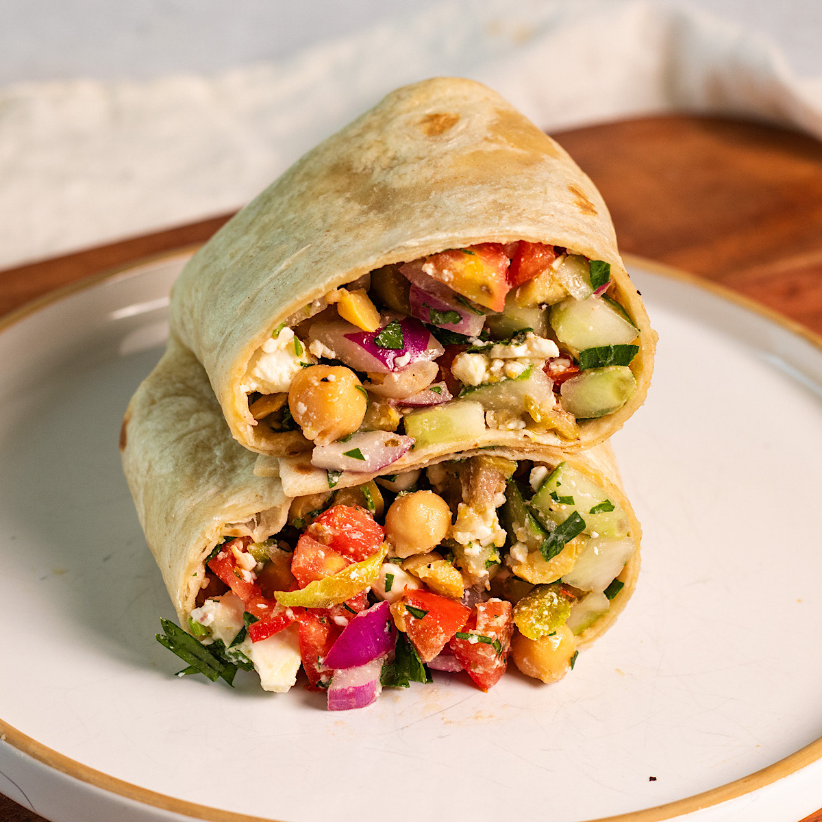chopped greek salad wrap with chickpeas