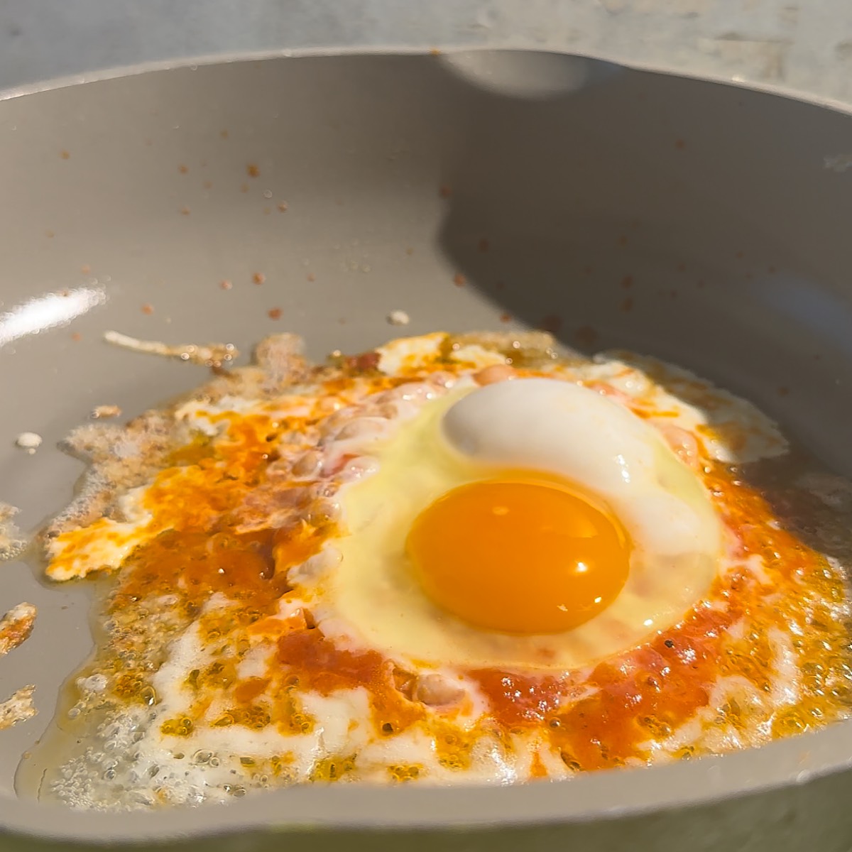 pizza egg in skillet