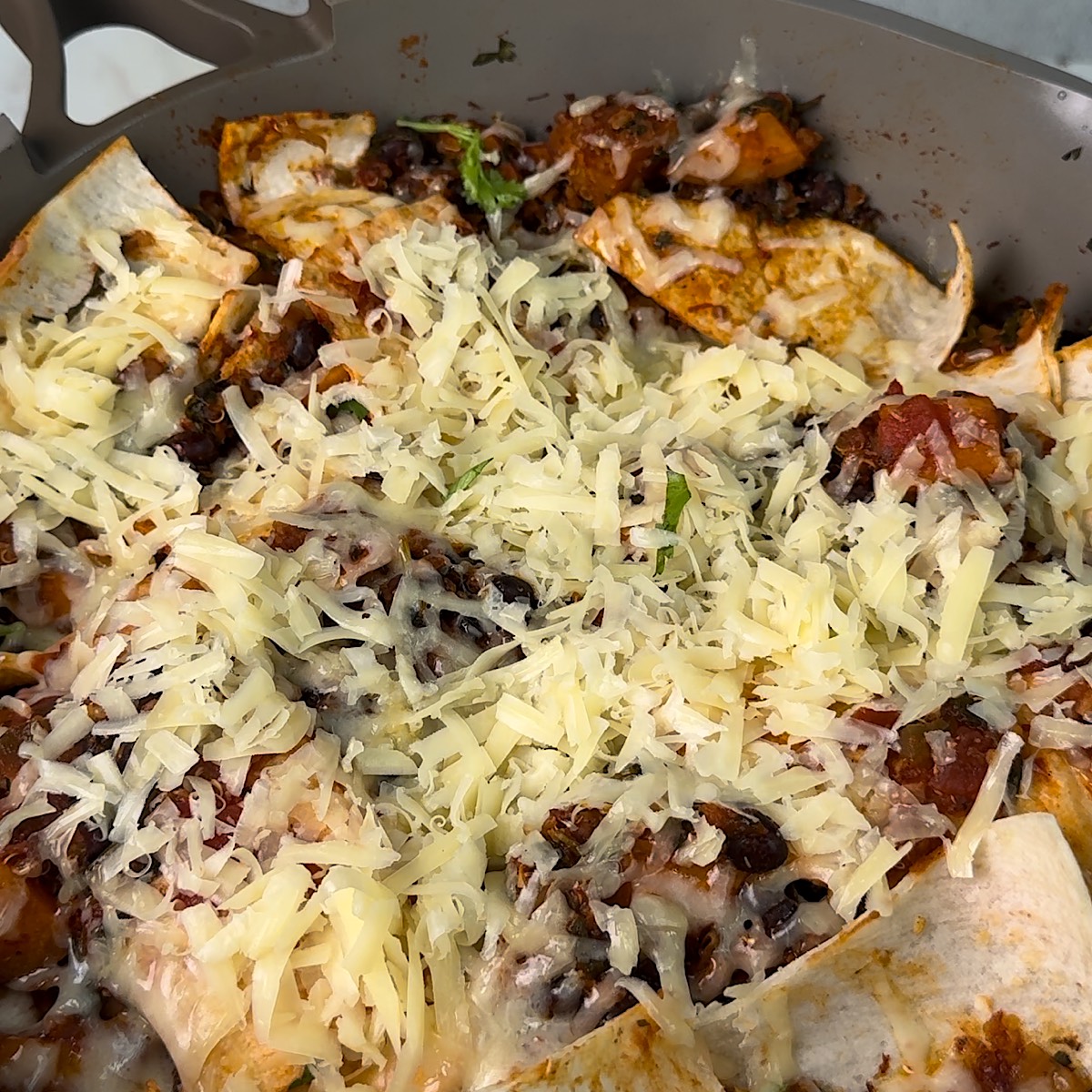 cheese and tortillas in skillet