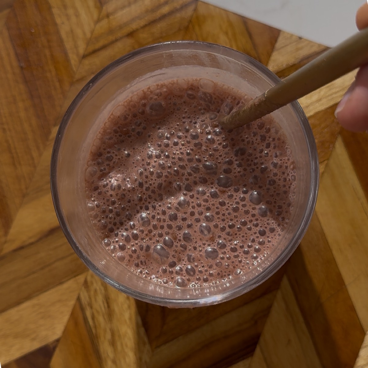 strawberry chia seed pudding being mixed