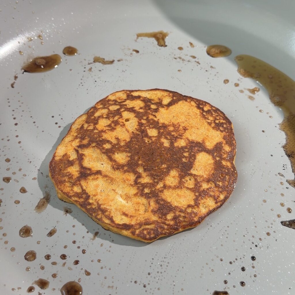 pancakes cooking in pan