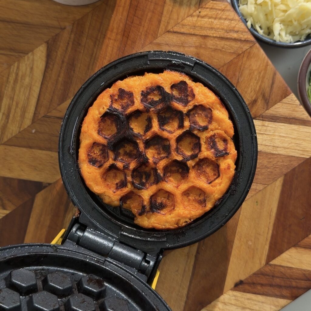 waffle cooking in waffle maker