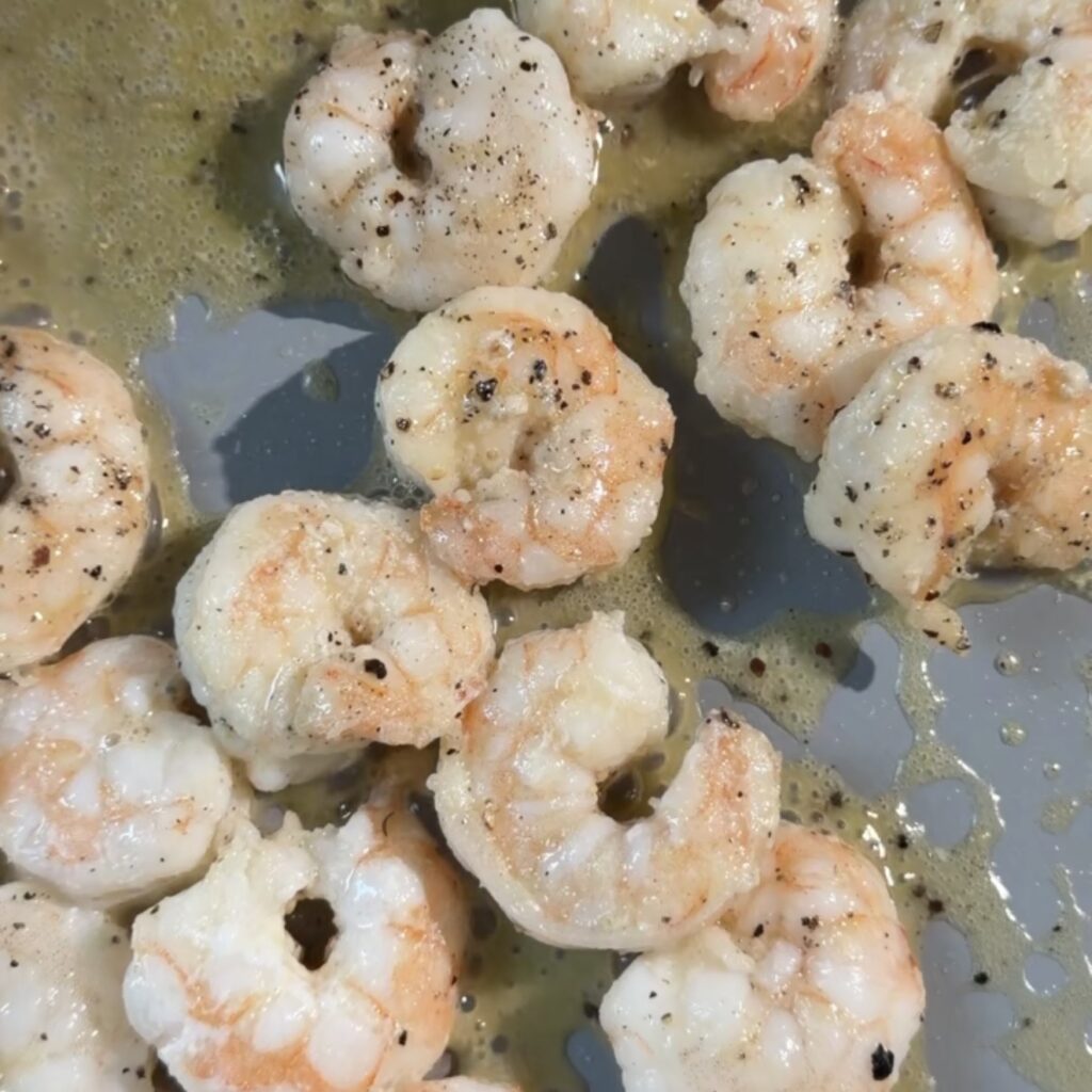 shrimp cooking in pan