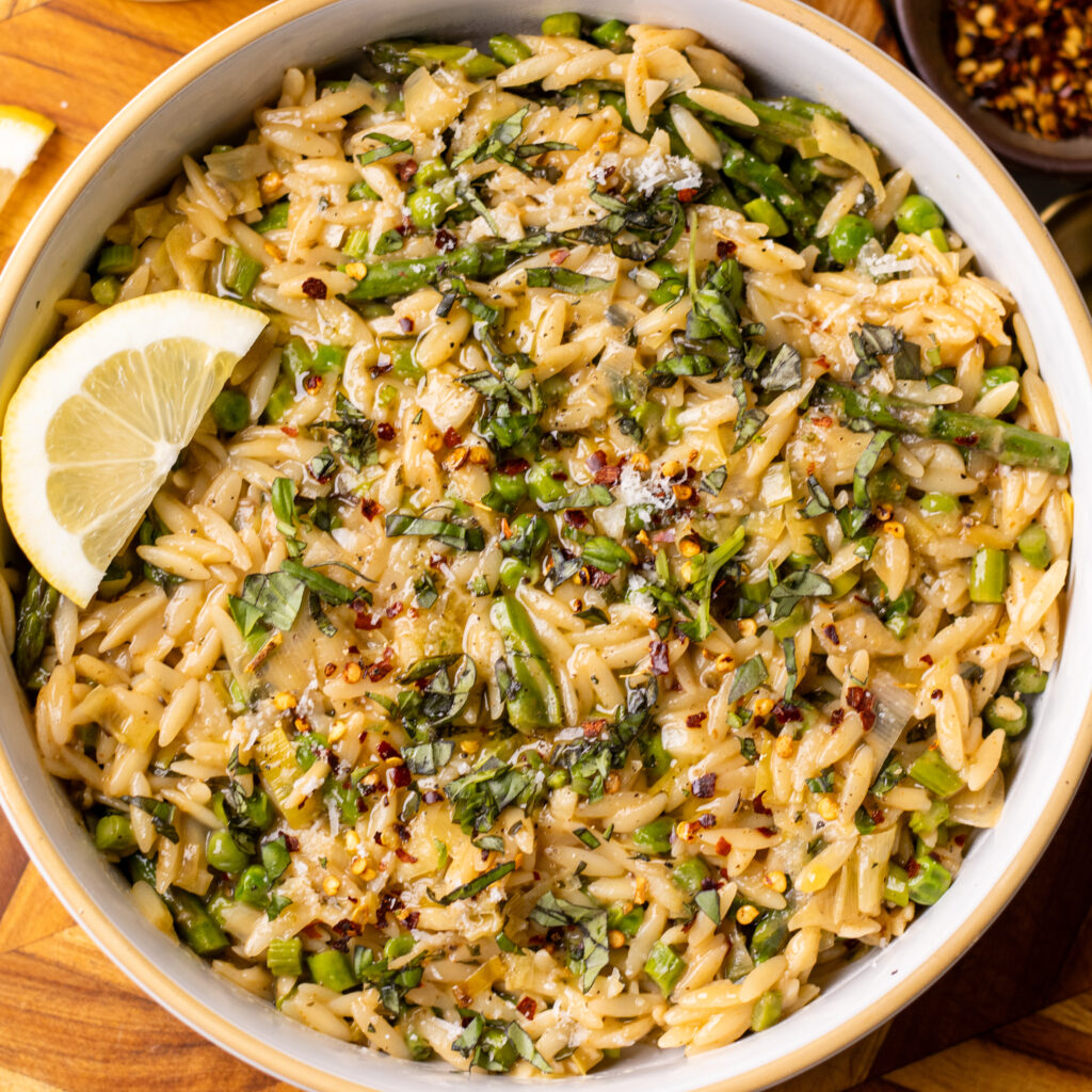 one pot garlic parmesan orzo with peas and asparagus