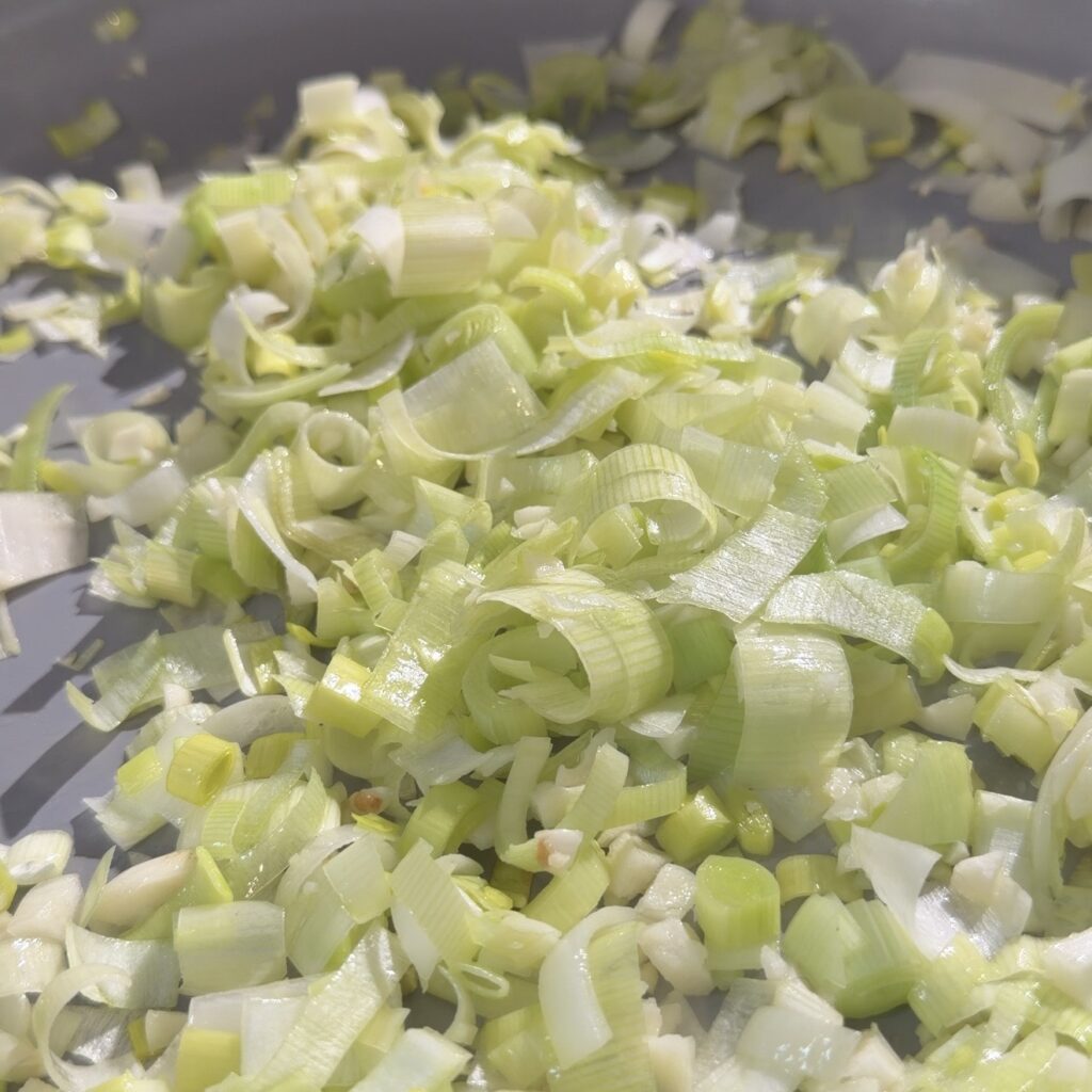 leeks and garlic in pan