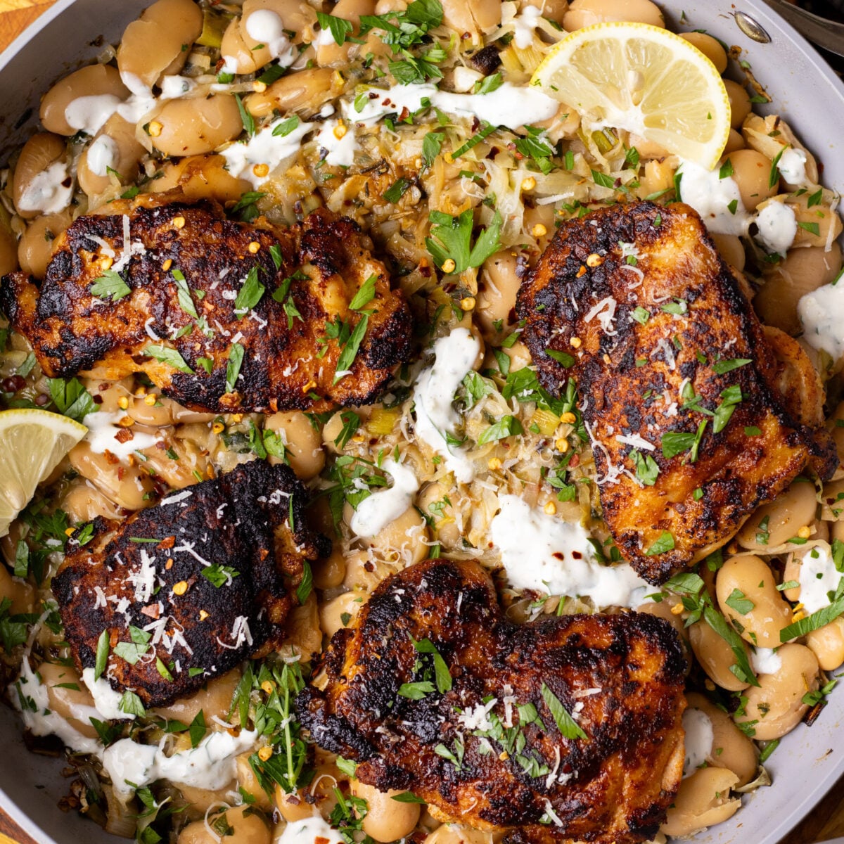garlic parmesan chicken thighs with beans and cabbage